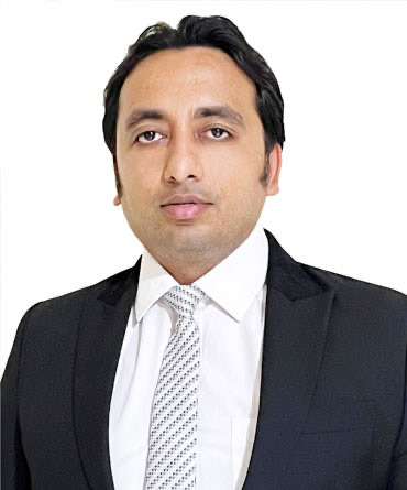 Portrait of Mr. Digant Sharma, entrepreneur and social architect, in formal business dress.