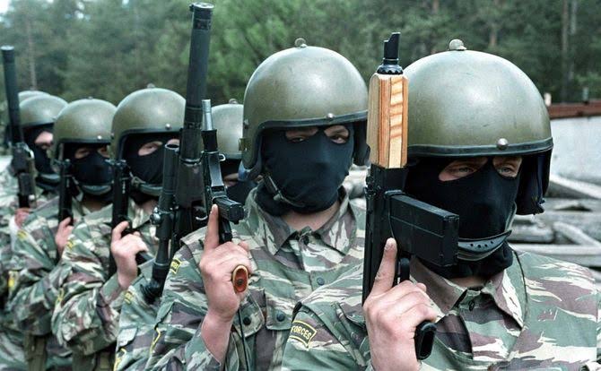 Uniformed personnel standing in disciplined ranks, illustrating the structured professional culture the organisation draws on.